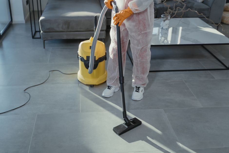 HEPA-filtered vacuuming used during mold remediation containment cleanup